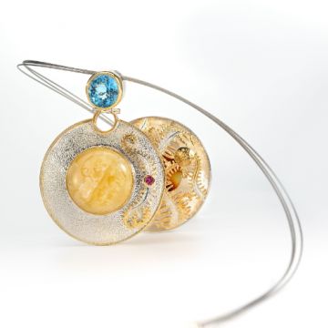 17. Pendant: Baltic amber, blue and pink topaz, gold-plated silver setting