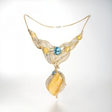 9. Necklace: Baltic amber, blue topaz, gold-plated silver setting